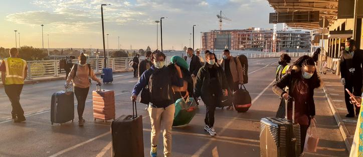 Scholarship holders and their baggage at OR Tambo